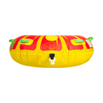 Profile view of the Citrus towable tube, a red and yellow circular inflatable with green grab handles and a sunburst pattern.