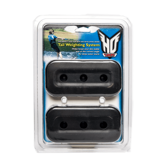 Front view of the Tail Weighting System in clear packaging with two black weights and an HO Skis logo.