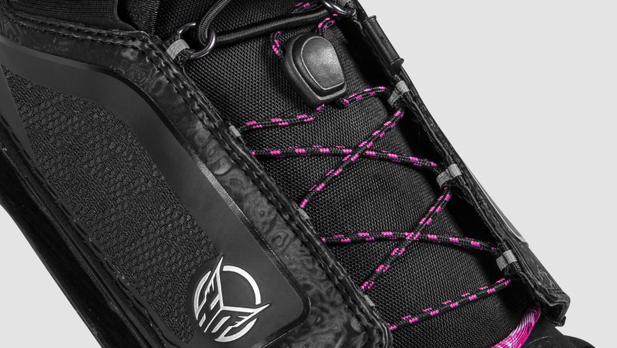 Close-up side view of Womens Stance 110 Front showing pink laces and HO logo badge detail.