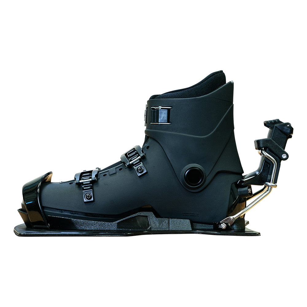 Side view of a black Syndicate Hardshell water ski boot and binding with cam buckles and release lever.