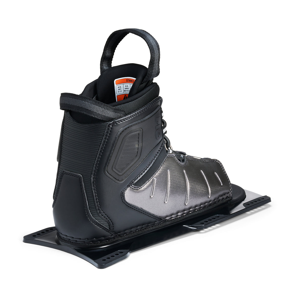 Rear angled view of Stance ATOP Front Boot in black and silver with pull loop and size label.