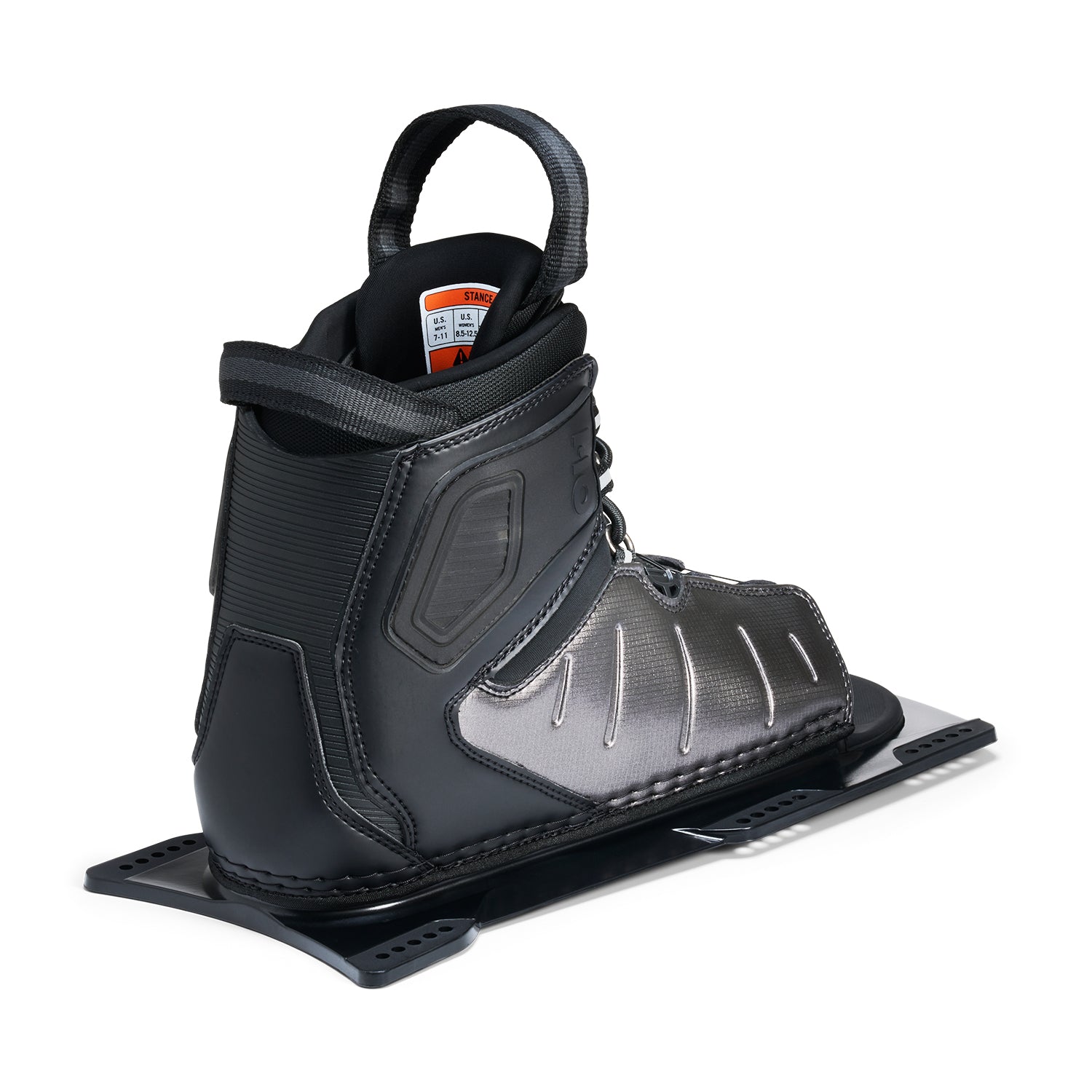 Rear angled view of Stance ATOP Front Boot in black and silver with pull loop and size label.