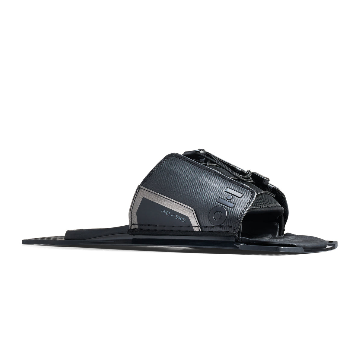 Angled side view of Stance UltraLite Adjustable Rear Toe Plate in black and gray with HO logo.