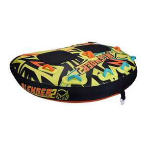 Left-angle view of the Blender 2 towable tube with a yellow, black, and orange pattern, padded seats, and multiple grab handles.