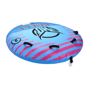 Angled view of the blue and pink Sunset 2 towable tube, showing its soft shell, grab handles, and bold HO Sports logo.