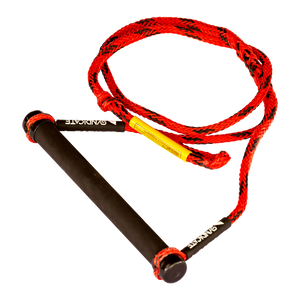 Angled view of a Syndicate Redline waterski handle with a black grip and red rope featuring black accents.