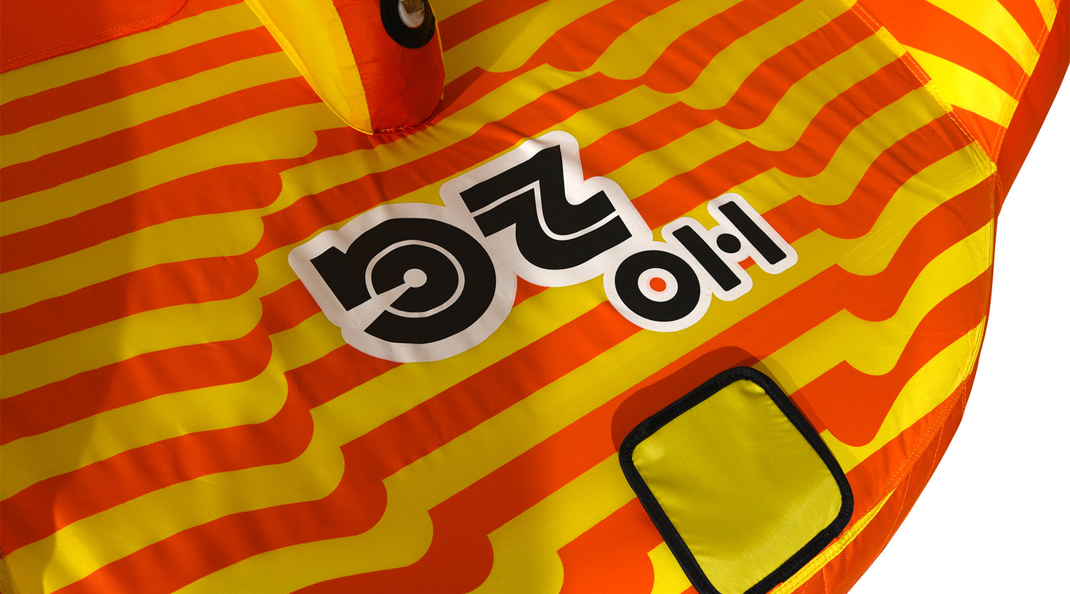 Angled top view of 2G Tube with bold striped pattern and visible logo design.