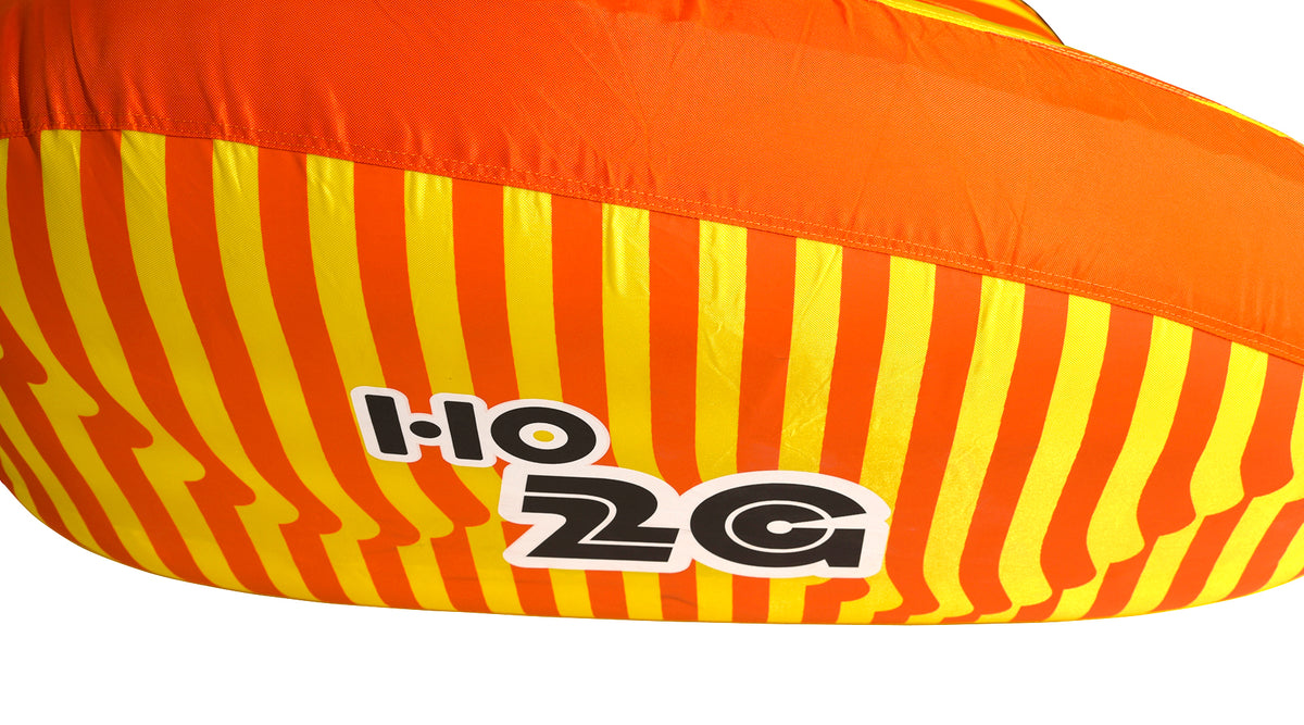 Close-up view of 2G Tube side panel with 2G logo on striped orange and yellow fabric.