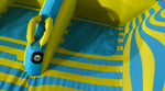Close-up view of 3G Tube interior with padded grab handle and blue seating.