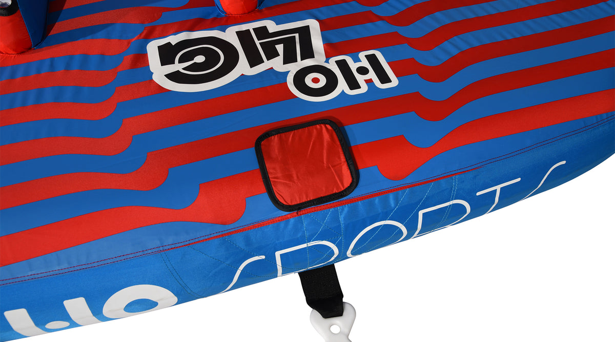 Angled top view of 4G Tube with red square patch and striped blue pattern.