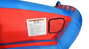 Close-up of the 4G Tube's red side panel with the tow-point cover and warning label.