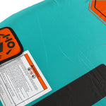 Close-up view of Glide 2 Tube orange HO logo patch and warning label on teal fabric.