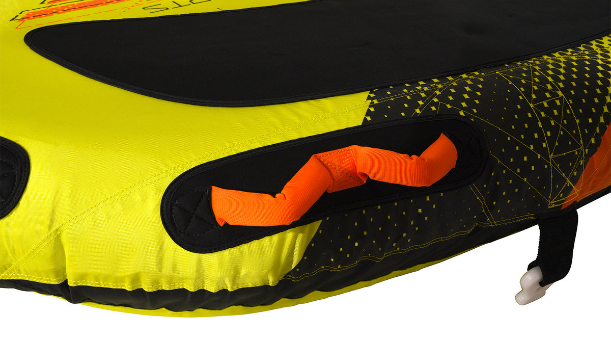 Close-up of an orange grab handle on the yellow and black dotted deck.