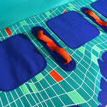 Detail view of Laguna 3 Tube interior with blue seat pads and orange grab handles.