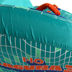 Side view of Laguna 3 Tube with teal fabric, orange handle, and logo print.