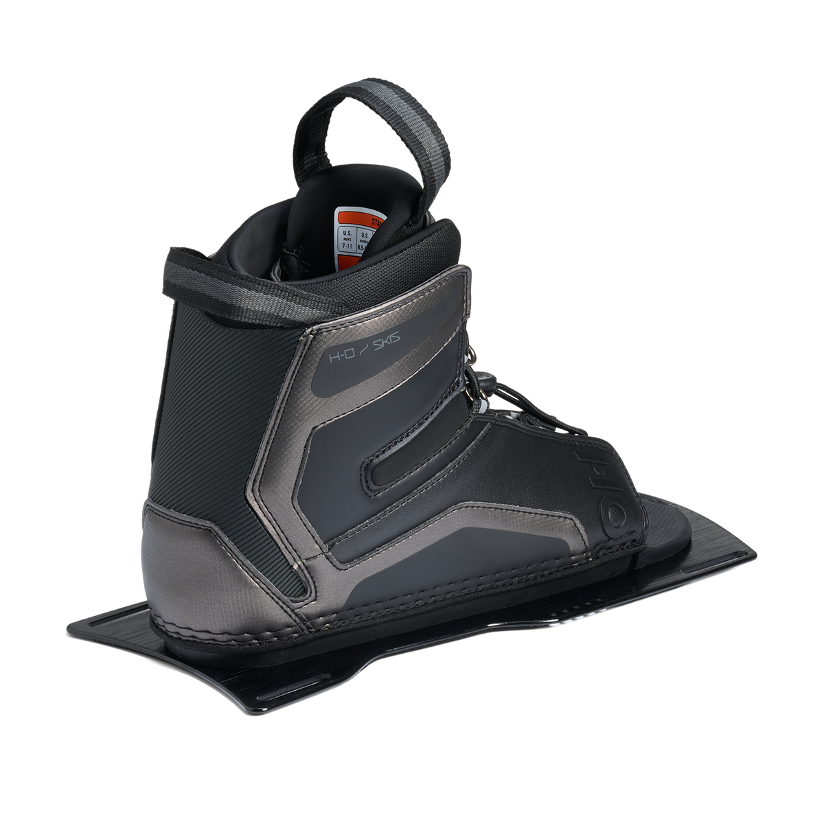 Rear angled view of Stance Aluminum Front Boot in black with pull loop and size label inside.