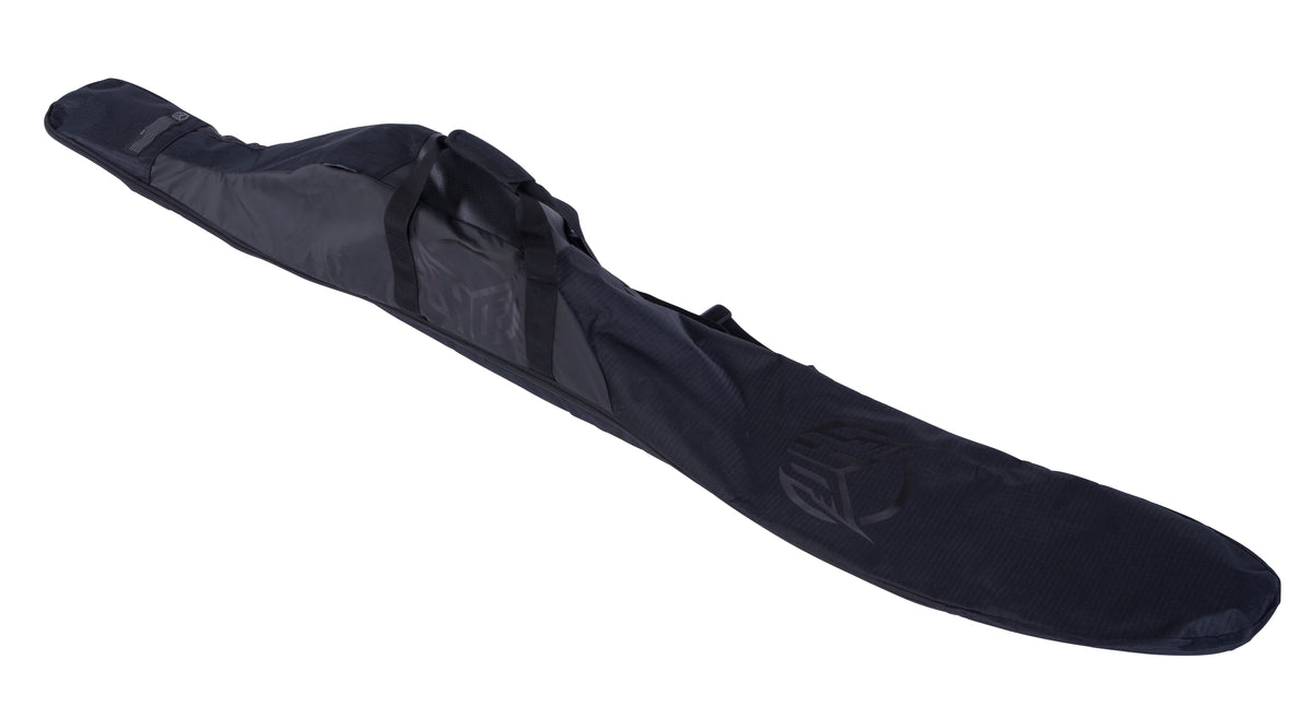 Angled view of the Universal Slalom Bag in black, padded ski bag with carry handles and tonal HO logo.