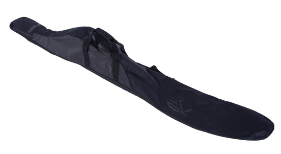 Angled view of the Universal Slalom Bag in black, padded ski bag with carry handles and tonal HO logo.