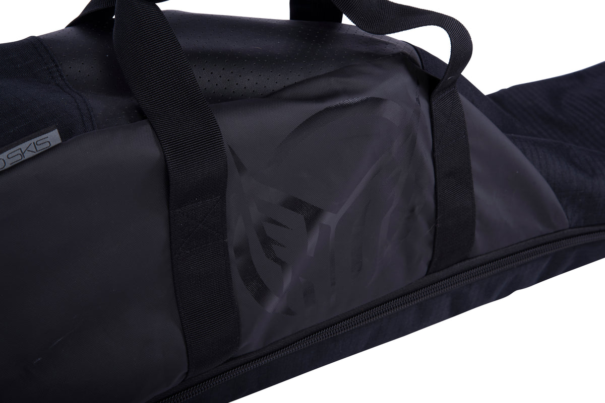 Close-up of the Universal Slalom Bag's carry handles and tonal HO logo panel.