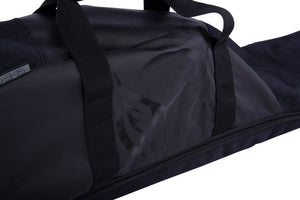 Close-up of the Universal Slalom Bag's carry handles and tonal HO logo panel.