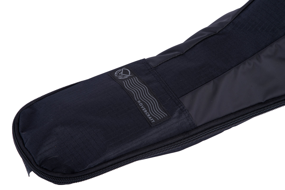 Close-up of the Hovercraft Bag's tapered end with the grey Hovercraft label and wave logo.
