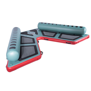 Left-angled view of the inflatable Hawaii Big Atoll in teal and red with black traction pads and dual side bolsters.