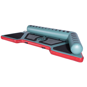 Angled view of the inflatable Hawaii Little Atoll in teal and red with black traction pads and a single side bolster.