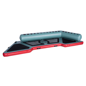 Left-angled view of the inflatable Hawaii Little Atoll in teal and red with black traction pads and a single side bolster.