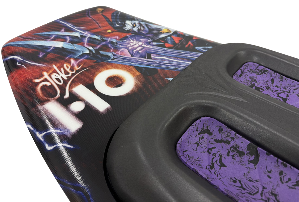Close-up of the Joker kneeboard with Powerlock strap, nose graphic and black kneepad with purple traction.