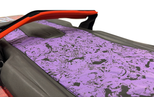 Close-up of the Joker kneeboard's purple and black marbled traction pad and red Powerlock strap.