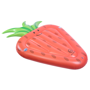 Angled view of the Strawberry Float lying flat, showcasing its inflatable shape, printed seeds, and green leafy top.