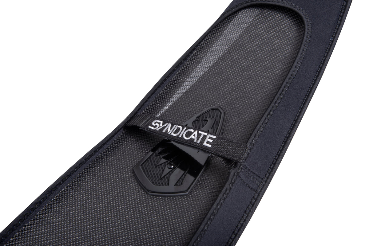 Close-up of the NEO Ski Sleeve's fin cutout and black Syndicate strap over the ski base.