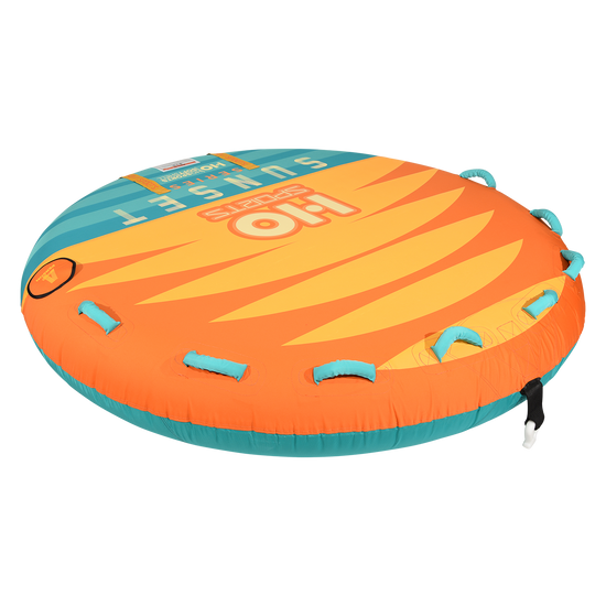 Angled view of the Sunset 4 Tube in orange and yellow with a sunburst graphic, teal base and foam handles.