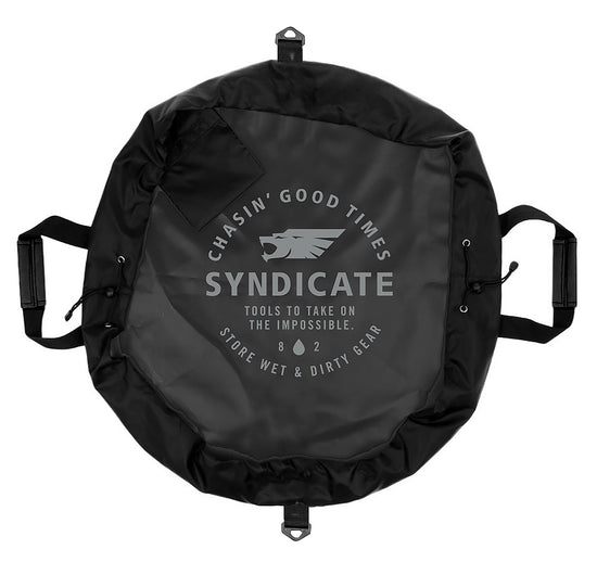 Top view of the Syndicate Cinch Changing Mat laid open flat, black with a grey Syndicate logo and side handles.