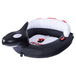 Angled view of the Orca towable tube, designed as a black and white killer whale with a backrest and red handles.