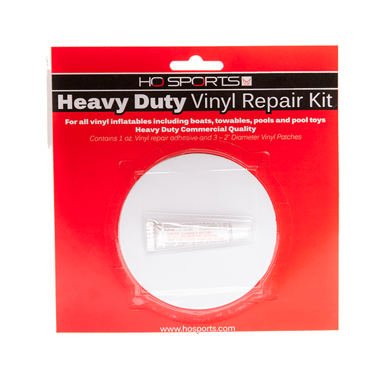 Front view of the Tube Patch Kit in red packaging, showing the adhesive tube and round vinyl patches inside.