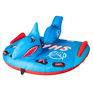 Angled view of the Shark towable tube, showing its side grab handles, red inflatable stabilizers, and contoured seating area.