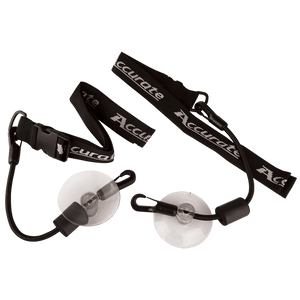 Angled view of the Tube Caddie, a pair of black straps with suction cups and clips, for securing tubes during transport.