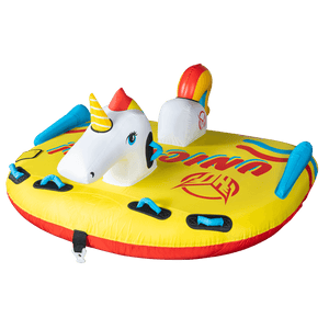 Side angled view of Unicorn, a yellow inflatable towable with a unicorn head and rainbow tail, featuring multiple handles.