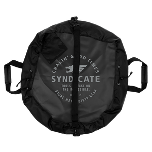 Cinched view of the Syndicate Cinch Changing Mat, showing a secured storage shape with reinforced handles and durable fabric.