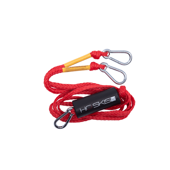 Angled view of the Rope Boat Tow Harness in red, coiled rope with metal clips and an HO Skis logo float.
