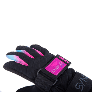 Angled view of the Syndicate Angel glove, showcasing black quilted fabric, pink logo accents, and a tie-dye finger design.