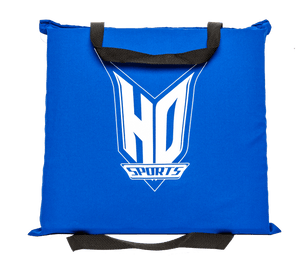 Front view of the blue Seat Cushion PFD with the white HO Sports logo, featuring black carrying straps on the top and bottom.