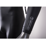 Close-up of the wetsuit sleeve, showing the Dry-Flex 1.5MM material with a sleek black finish and white logo detailing.