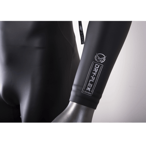 Close-up of the wetsuit sleeve, showing the Dry-Flex 1.5MM material with a sleek black finish and white logo detailing.