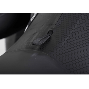 Close-up of the Syndicate Fullsuit's hex-textured back panel and black webbing pull loop.