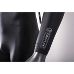 Close-up of the wetsuit sleeve, showing the Dry-Flex 1.5MM material with a sleek black finish and white logo.