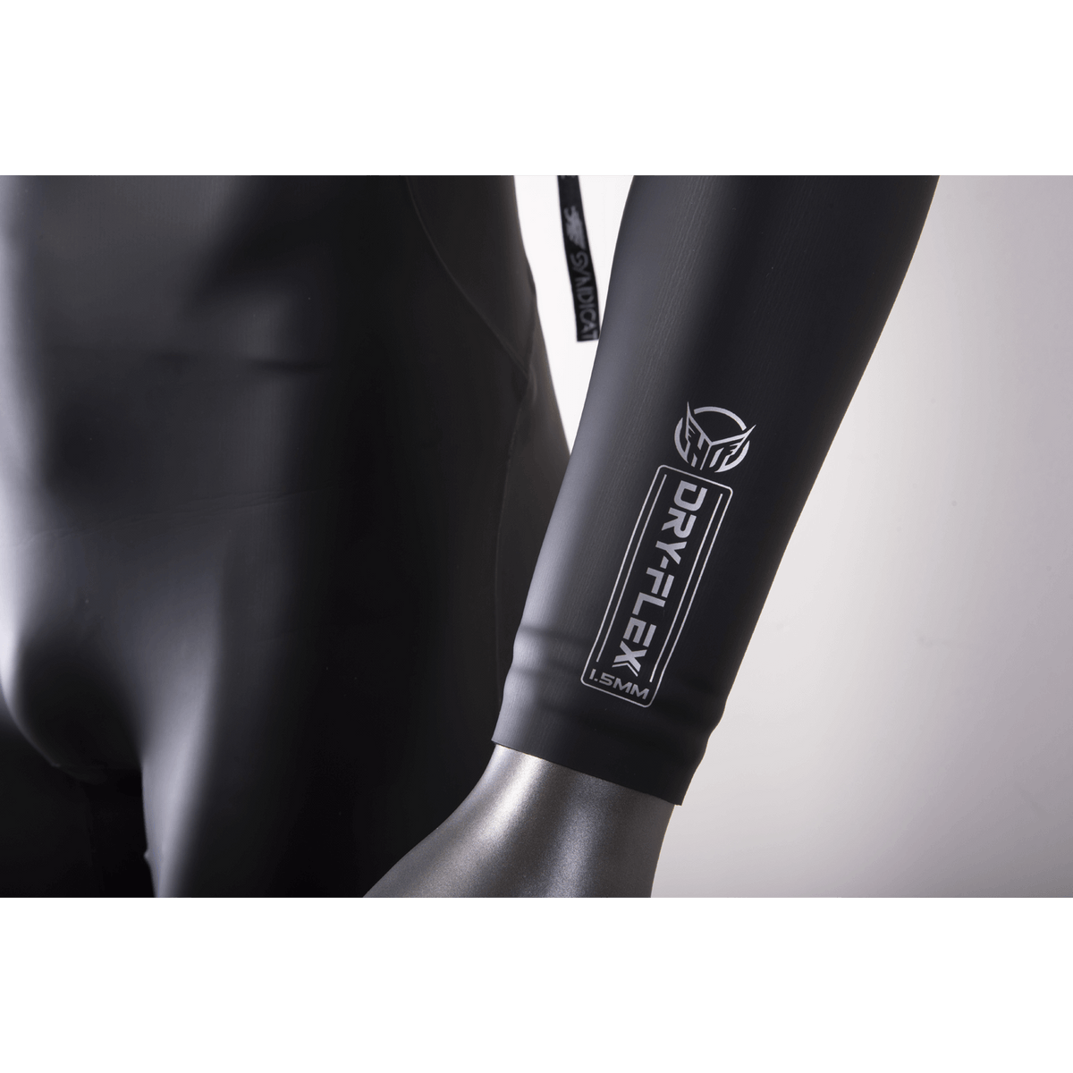 Close-up of the Syndicate LS Spring Suit's forearm cuff with silver DRY-FLEX and HO logo.