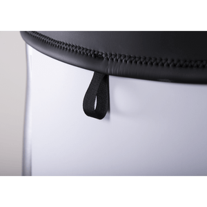 Close-up of the wetsuit hem, featuring a black stitched edge with a small pull loop for easy adjustments.